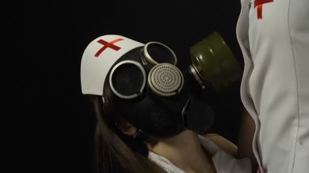 Two sexy girls in gas mask — Stock Video