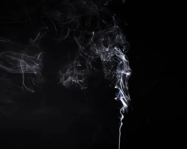 Horizontal swirl of burning aromastick — Stock Photo, Image
