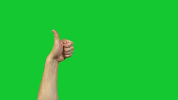 Male left thumb on green background — Stock Video