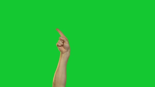Wijsvinger wijzen op groene achtergrond — Stockvideo