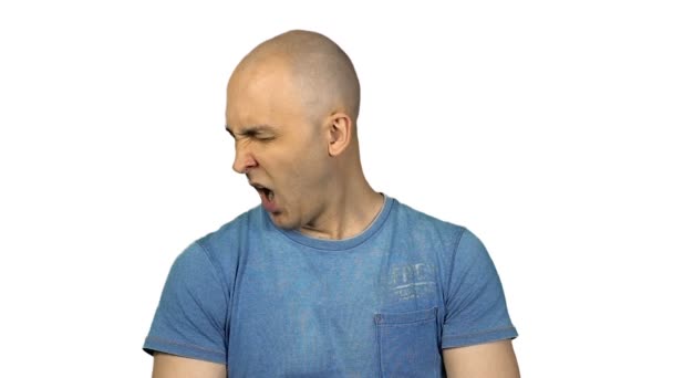 Yawning bald man on white background — Stock Video