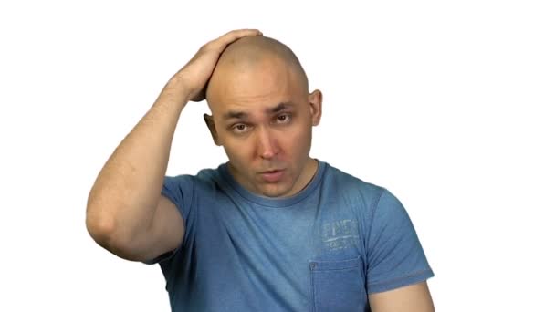 Young bald man on white background — Stock Video