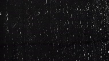 Siyah arka plan, 4k video üzerine damla doku