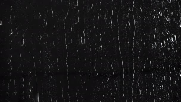 Padrão de gotas no fundo preto, vídeo 4k — Vídeo de Stock