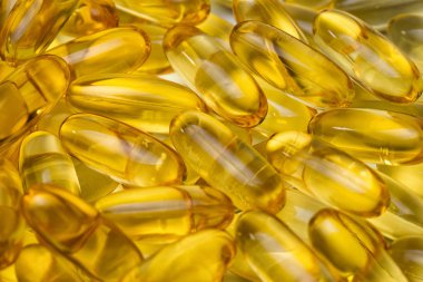 Fotoğraf arka plan sarı sağlıklı omega 3 hap