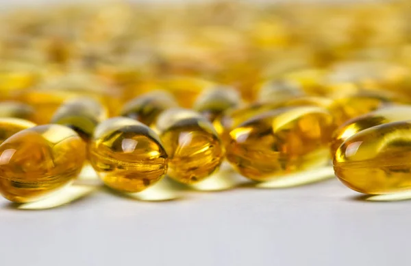 Image de fond de vitamine d jaune en capsules — Photo