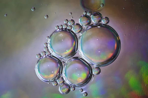 Image textured holographic bubbles on colorful background — Stock Photo, Image