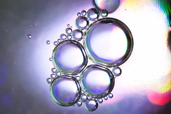 Photo of oil bubbles texture on colorful background — Stock Photo, Image