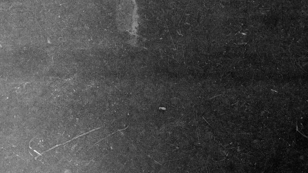 Texture of film on black background and scratches — Stock Photo, Image