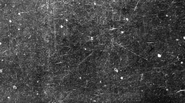 Текстура старої плівки на чорному тлі з подряпинами — стокове фото