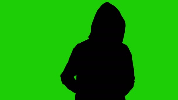 毒品贩子在绿色背景上的剪影 — 图库视频影像