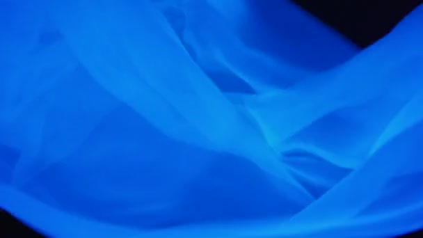 Vidéo de matériau d'ondulation blanc à la lumière ultraviolette 