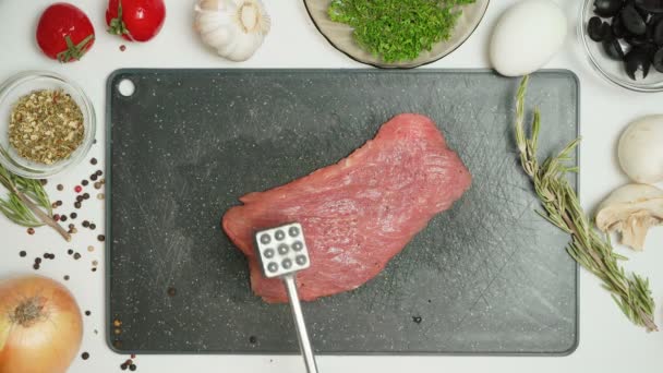 Video of meat and tenderizer in the kitchen — ストック動画