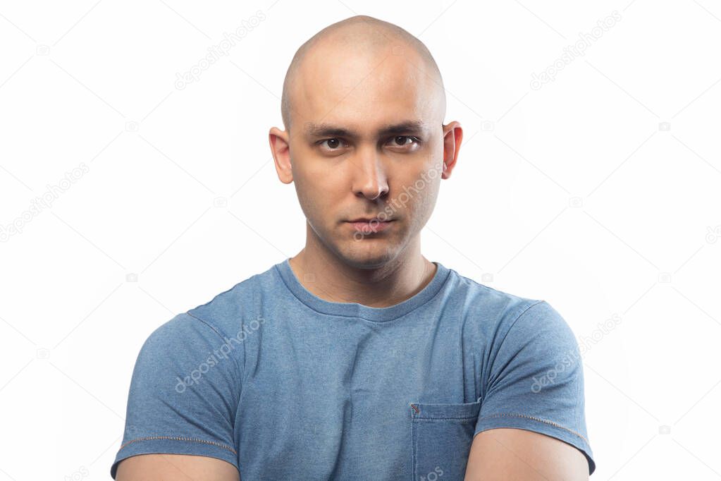 Photo of young shaved man on white background