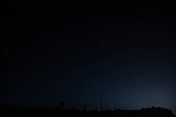 Imagen del cielo azul nocturno con estrellas — Foto de Stock