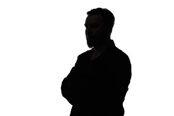 Silhouette eines bärtigen Mannes auf weißem Hintergrund — Stockfoto