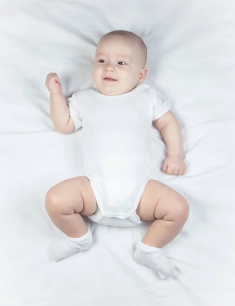 Image of a six-month-old baby on a white background — Stock Photo, Image