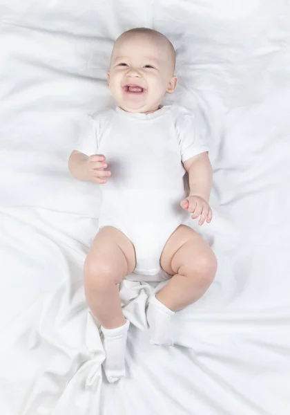 Photo of laughing six month old baby boy — Stock Photo, Image