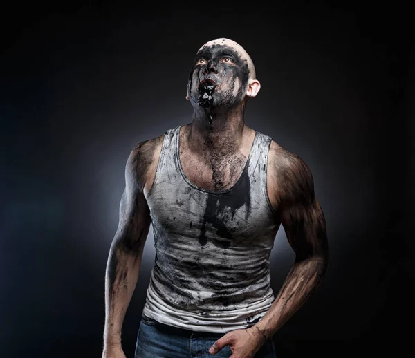 Image of bald man with black goo in the mouth — Stock Photo, Image