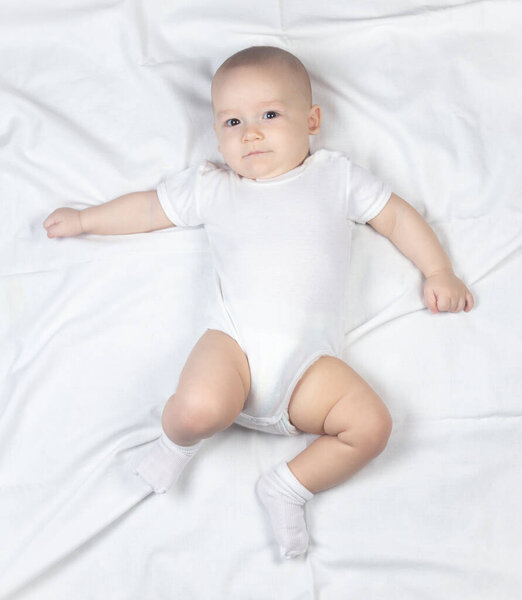 Image of a seven-month-old baby on a white background