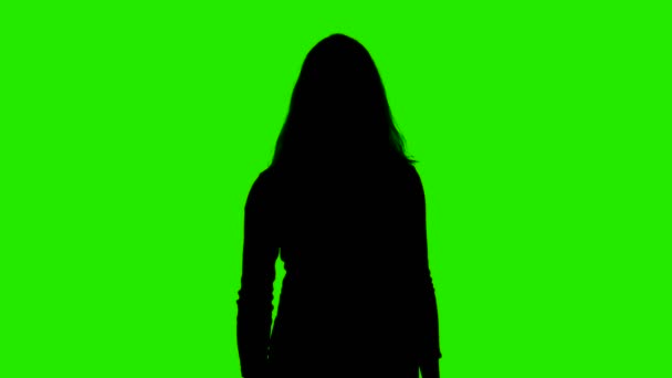 Video van vrouwen silhouet met pistool op chroma sleutel — Stockvideo