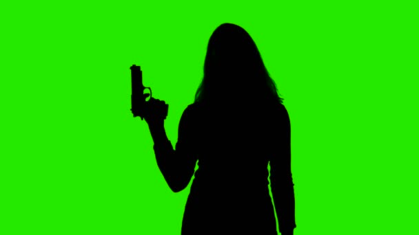 Video av kvinnor silhuett med pistol på kromnyckel — Stockvideo