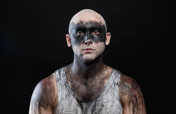 Photo of young bald mad man with dirty make-up effect — Stock Photo, Image