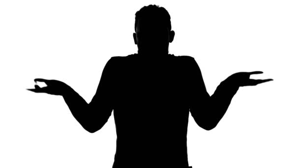 Video of mans silhouette shrugging his hands — Stock Video