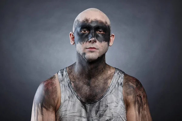 Picture of young bald mad man with dirty make-up effect — Stock Photo, Image