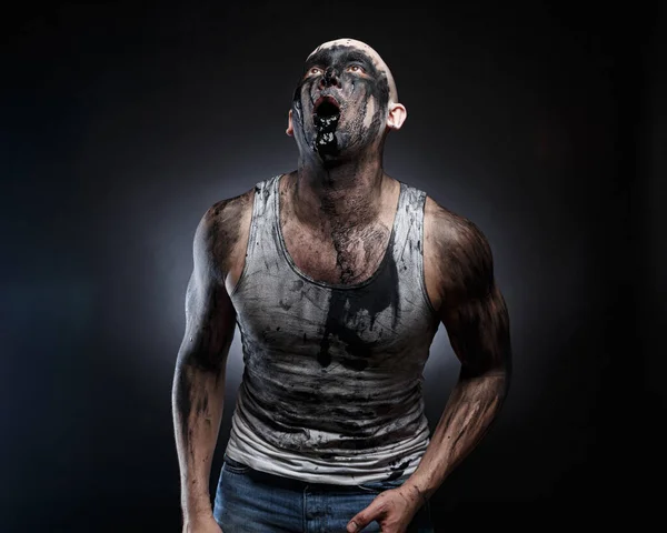 Bald man with black goo in the mouth — Stock Photo, Image