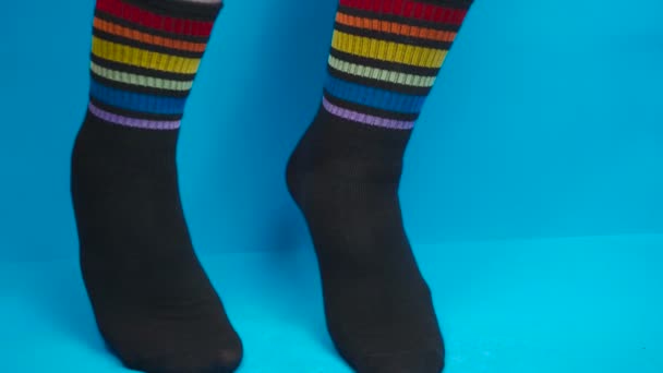 Flirting socks with rainbow colors, allegory — Stock Video