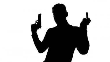 Adamın siluetinin silueti ve sikişen parmağını gösteren bir video.