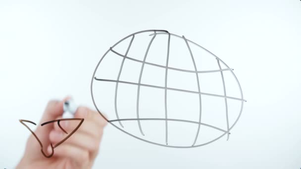 Erschießung eines Menschen, der einen Planeten mit Längen- und Breitengrad zeichnet — Stockvideo