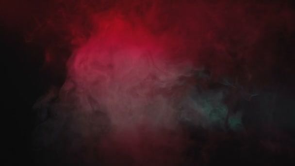 Vídeo de fumaça nublada vermelha e verde de cigarro eletrônico — Vídeo de Stock