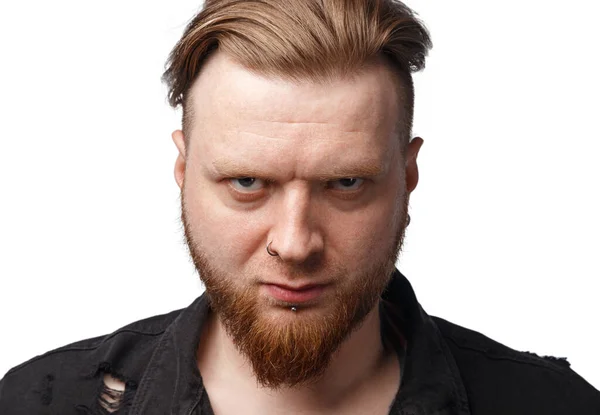 Portrait of bearded angry man in black jeans jacket — Stock Photo, Image