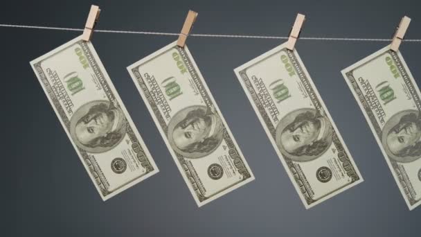 Money hanging on clothesline rope — Stock Video