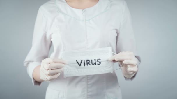 Video of woman holding medical infected mask — Stock Video