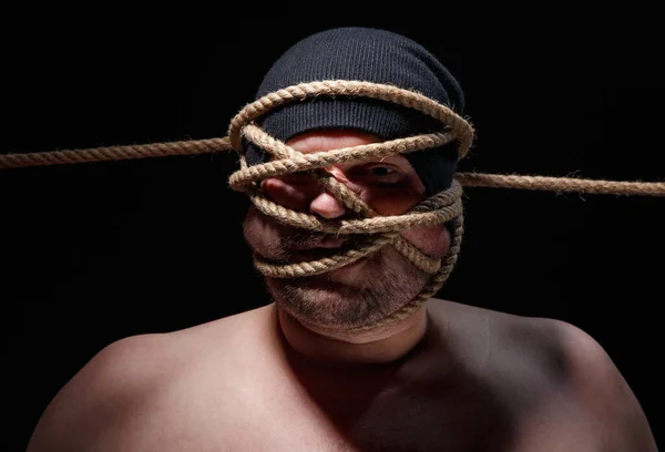 Picture of binded fat man with rope on face — Stock Photo, Image