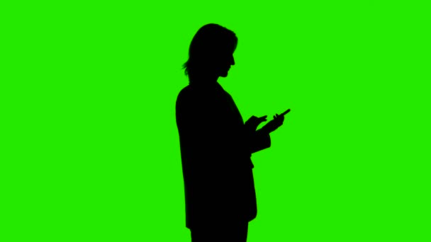 Video van praten op de telefoon vrouwen silhouet — Stockvideo