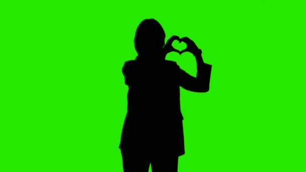 Video of womans silhouette making heart — Stock Video