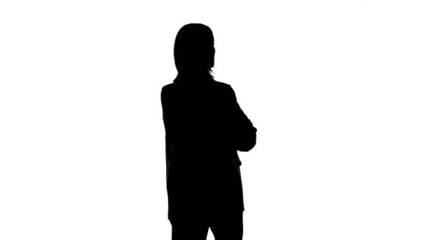 Video of womans silhouette in suit jacket with arms crossed — Stock Video