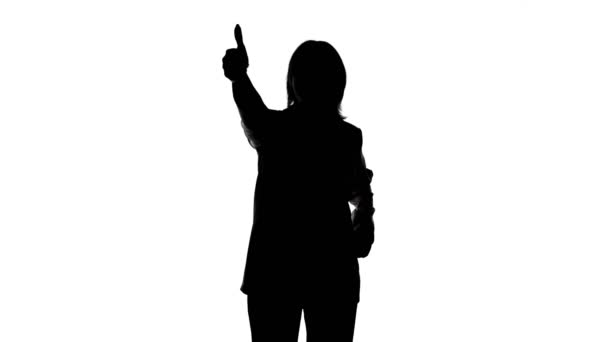 Bilder på kvinnor siluett i kostym jacka med tummen gest — Stockvideo