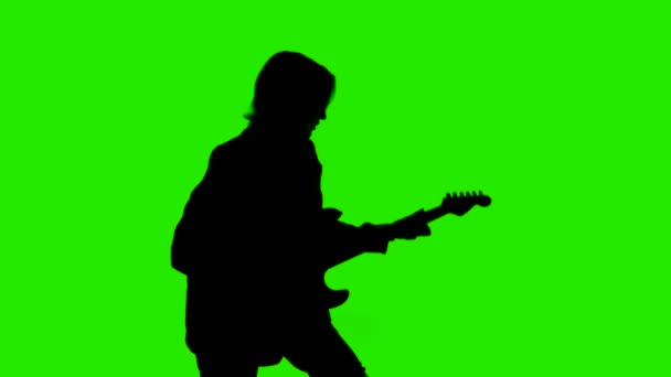 Footage of womans silhouette with bass guitar — Stock Video