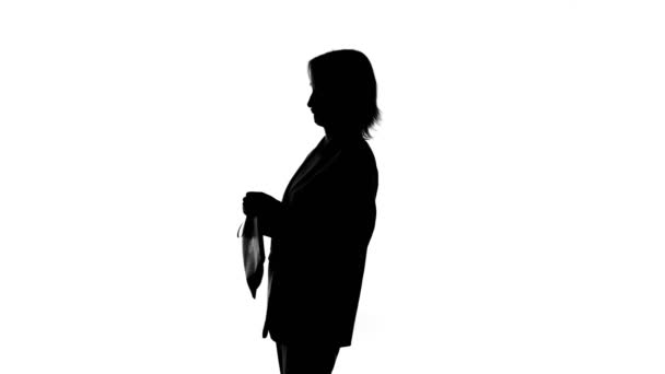 Video of womans silhouette pay back money on isolated white background — Stock Video