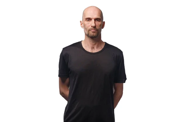 Image of bald serious adult man in black shirt — Stock Photo, Image
