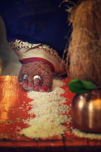 Bride completing Indian hindu marriage rituals
