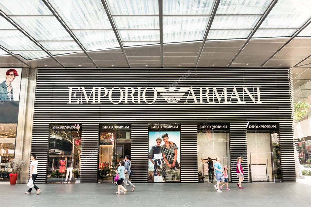 SINGAPORE - DECEMBER 2, 2015: Emporio store on Orchard Road - The core business is an Italian luxury fashion house founded by Giorgio Armani - The company also operates a range of cafes worldwide