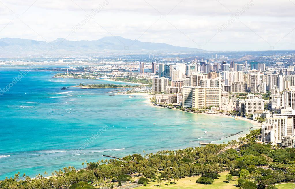 Panorama skyline view of Honolulu city and Waikiki beach in the pacific island of Oahu in Hawaii - Postcard from Diamond Head crater of exclusive travel destination - Warm day filter