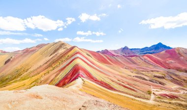 Panoramic view of Rainbow Mountain at Vinicunca mount in Peru - Travel and wanderlust concept exploring world nature wonders - Vivid multicolor filter with bright enhanced color tones clipart