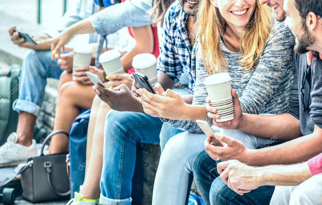 Millenial friends group using smartphone with coffee at university college - People hands addicted by mobile smart phone - Technology concept with always connected trendy millennials - Filter image